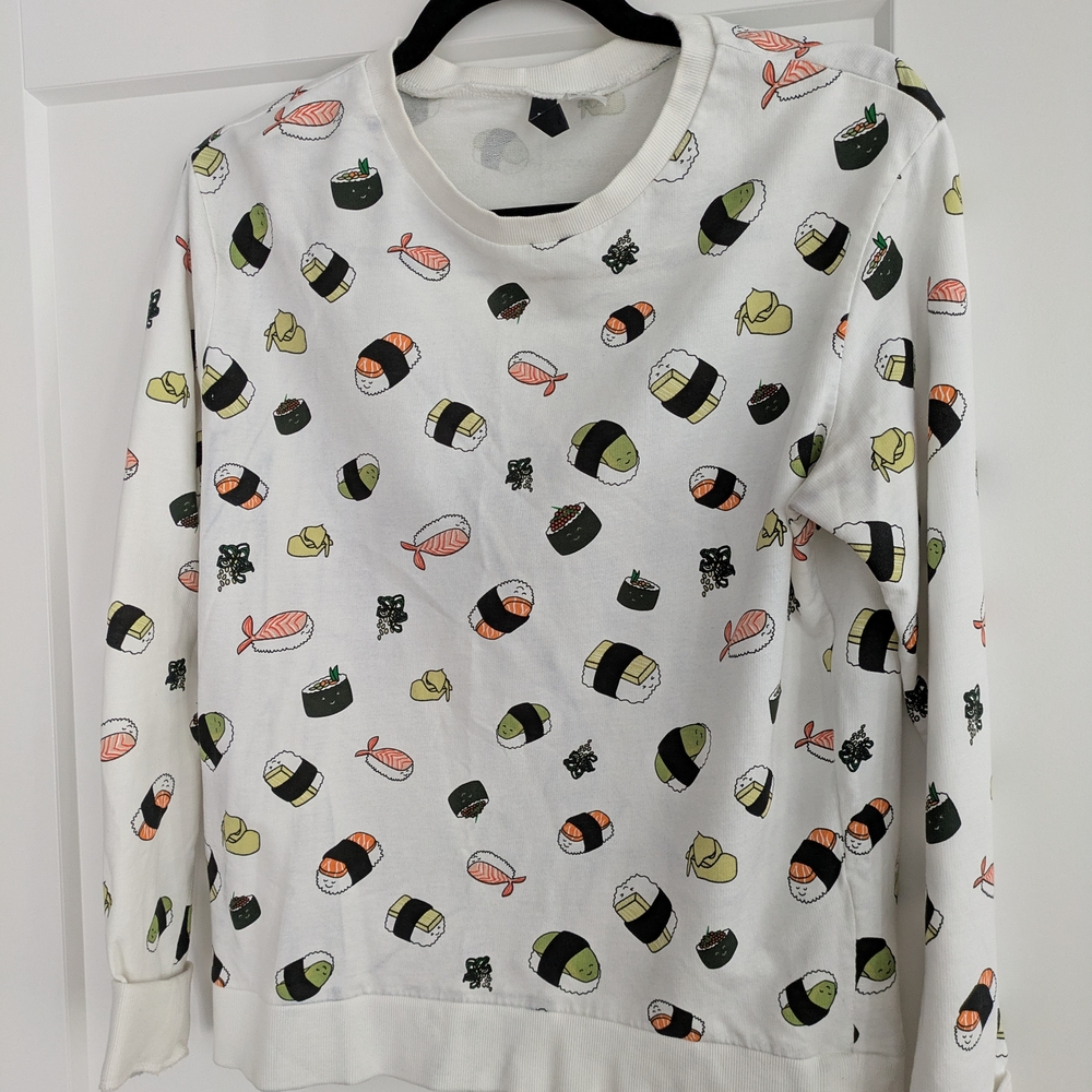 Divided White and Black Crew Neck Sweater with Playful Print